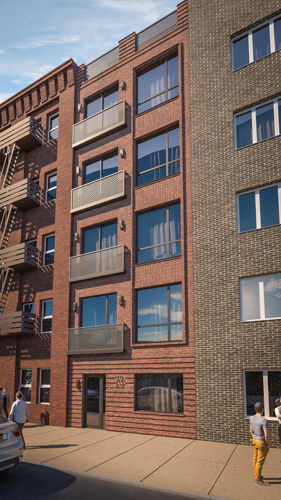 Red brick mid-rise with steel mesh balconies