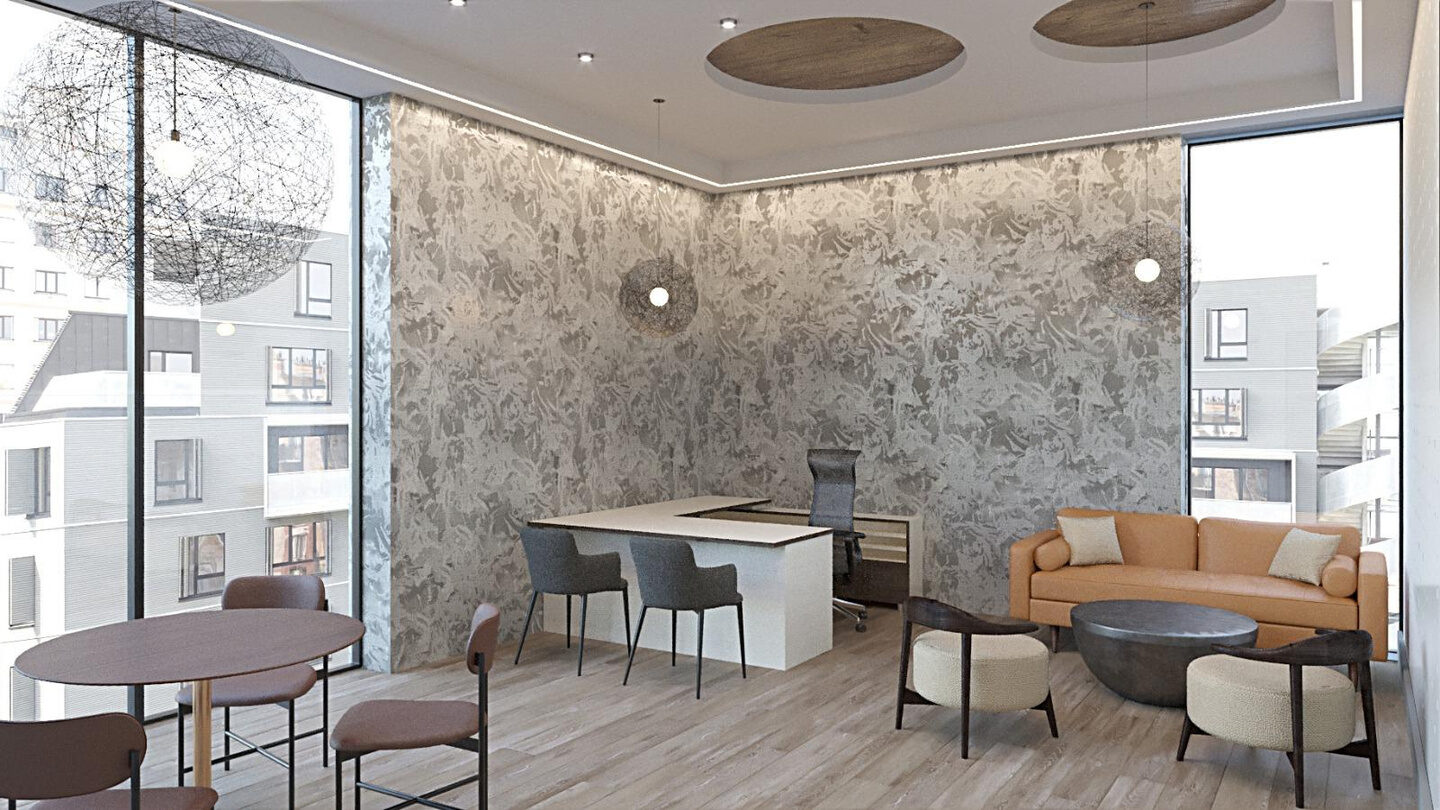 Executive office suite with patterned wall covering, lounge area and city views